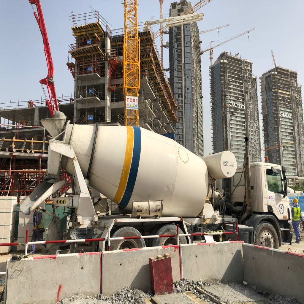 High-rise tower at dusk with warm interior lighting